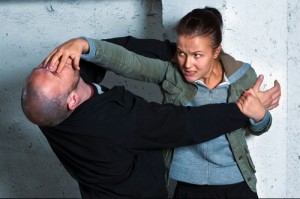 female demonstrating eye gouge - benefits of krav maga