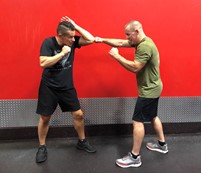 matt numrich with filipino martial arts blocking