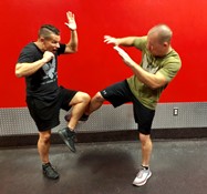 matt numrich with filipino martial arts kicking